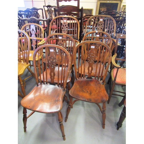 1418 - Set of six (four plus two) reproduction oak and elm Windsor type wheelback dining chairs with shaped... 