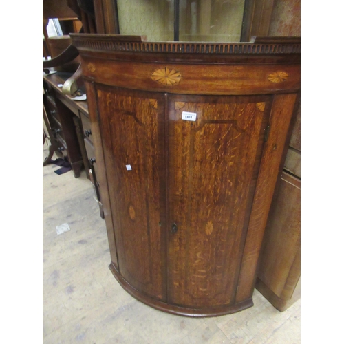 1431 - George III mahogany and line inlaid two door bow front hanging corner cabinet, 106cms high