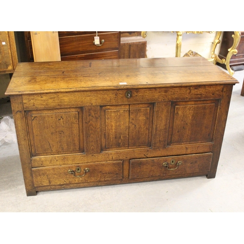 1435 - 18th Century oak mule chest, the hinged moulded plank lid above a three fielded panel front and two ... 