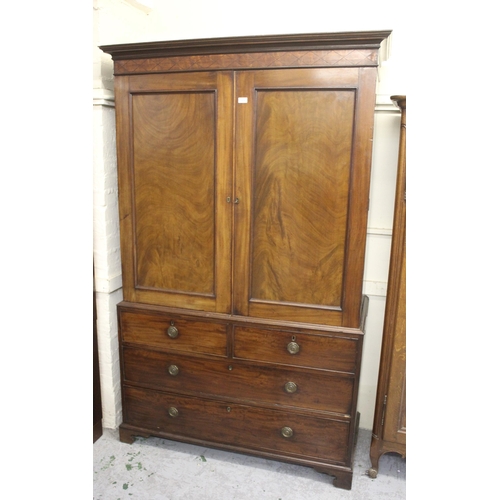 1438 - 19th Century mahogany linen press, the moulded cornice above a line inlaid frieze and two panel door... 