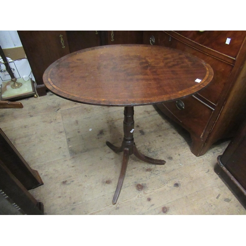 1445 - Victorian walnut pedestal table, the shaped figured top above a spiral turned column support and tri... 