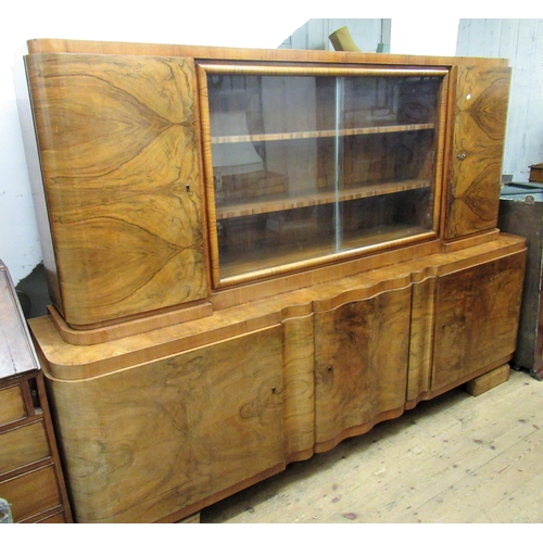 1452 - Art Deco burr walnut side cabinet, the top having two central glazed sliding doors flanked by two bo... 