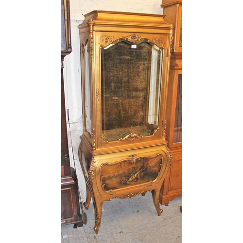 1468 - Late 19th / early 20th Century French giltwood vitrine, the moulded top above a bevelled glass door,... 