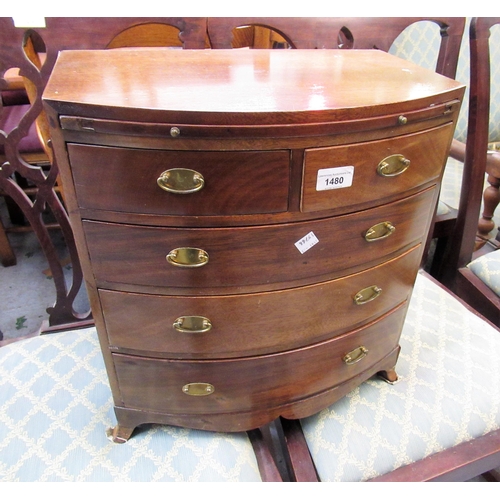 1480 - Reproduction mahogany bow front miniature chest of drawers, with brushing slide and splay supports, ... 