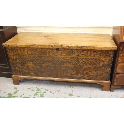 1483 - Large 18th /19th  Century Scandinavian pine coffer, with a hinged plank lid above a poker work front... 