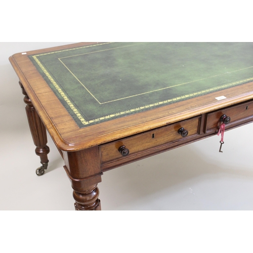 1485 - Victorian mahogany partners writing table, the gilt tooled green leather inset top above six frieze ... 