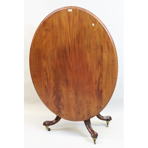 1494 - Victorian oval figured mahogany centre table on turned centre column and quadruped base, together wi... 