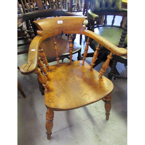 1503 - 19th Century elm and beech smoker's bow back chair on turned supports with stretcher