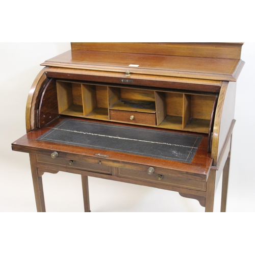 1507 - Edwardian mahogany and chequer line inlaid cylinder desk with two frieze drawers, raised on square t... 