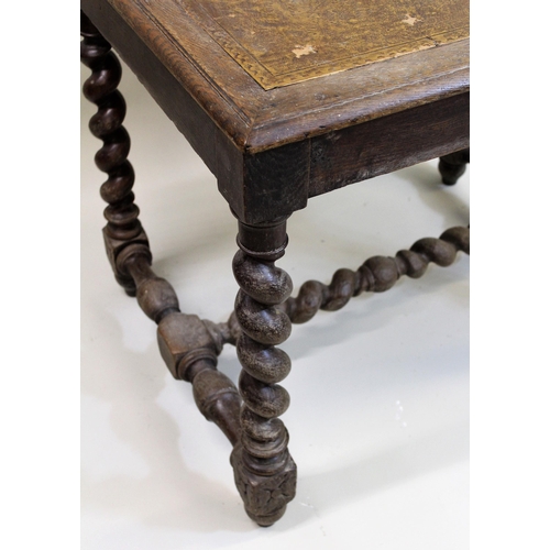 1538 - Late 19th / early 20th Century rectangular oak writing table with a leather inset top, raised on bar... 