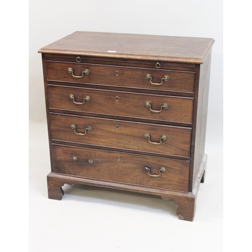 1549 - George III mahogany dwarf chest, the moulded top above a brushing slide and four graduated drawers, ... 