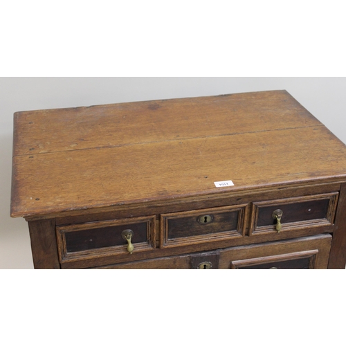 1551 - Small oak moulded front chest of four long drawers, raised on low stile feet (17th Century and later... 