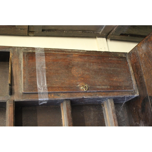 1555 - 18th Century oak dresser, the boarded shelf back with two cupboard doors, the base with three drawer... 