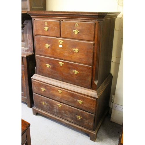 1557 - Small 18th Century oak chest on chest, the moulded cornice above two short and four long drawers wit... 