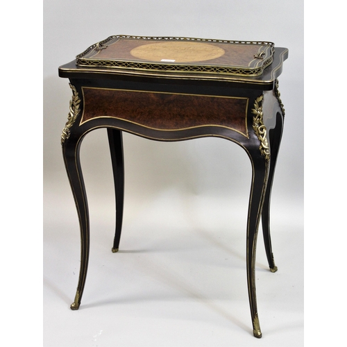 1569 - 19th Century Birdseye maple amboyna cut brass and ebonised jardiniere, the shaped removeable top enc... 