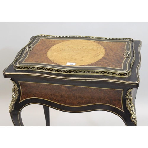 1569 - 19th Century Birdseye maple amboyna cut brass and ebonised jardiniere, the shaped removeable top enc... 