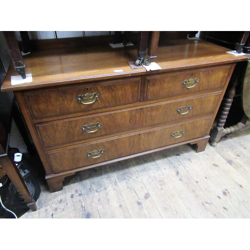 1584 - Late 19th / early 20th Century walnut chest of two short and two long drawers, with brass handles ra... 