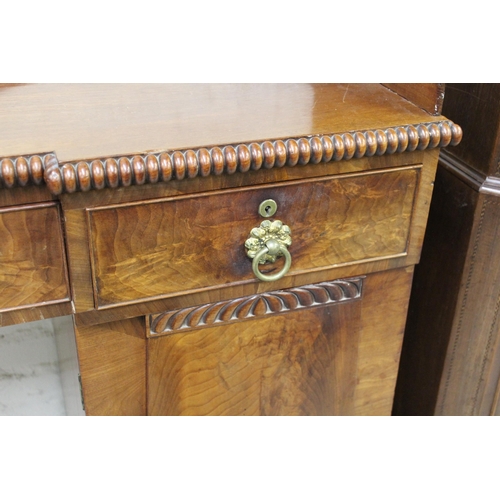 1598 - George IV figured mahogany inverted breakfront twin pedestal sideboard, the low galleried back above... 