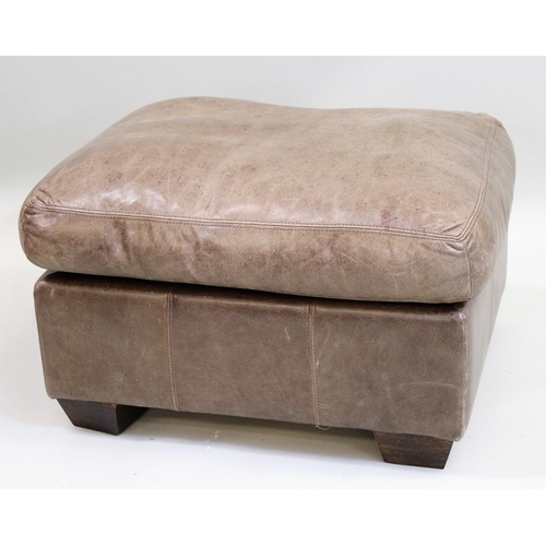 1601 - Modern mid tan leather rectangular footstool on low tapered supports, 75cms wide approximately