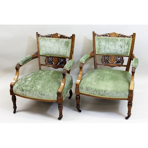 1602 - Pair of Edwardian rosewood marquetry inlaid drawing room chairs, the carved pierced backs with uphol... 