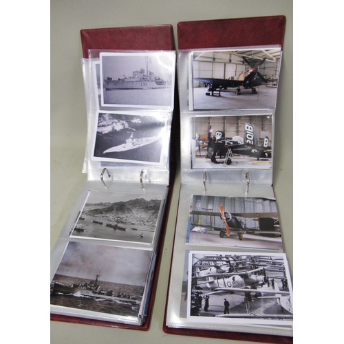 268 - Two red albums containing a large quantity of various photographs and postcards of boats, aircraft a... 