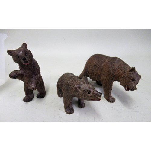 291 - Three small Black Forest carved figures of bears