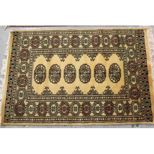 3 - Small Pakistan Bokhara design rug with a single row of gols on a beige ground, 194cms x 65cms togeth... 