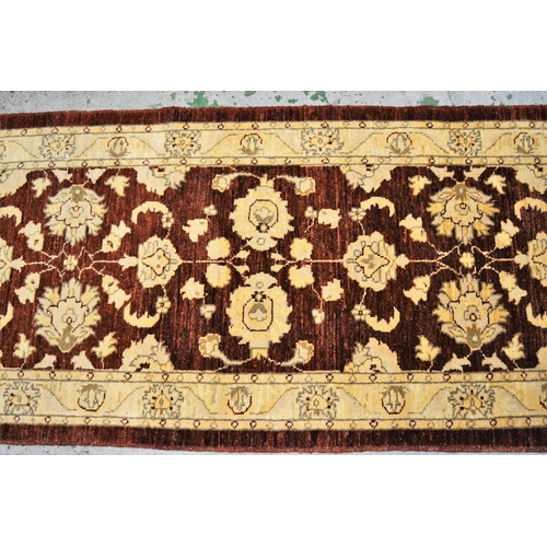 45 - Afghan Ziegler design runner with an all-over palmette design in shades of beige, rust and gold, 288... 