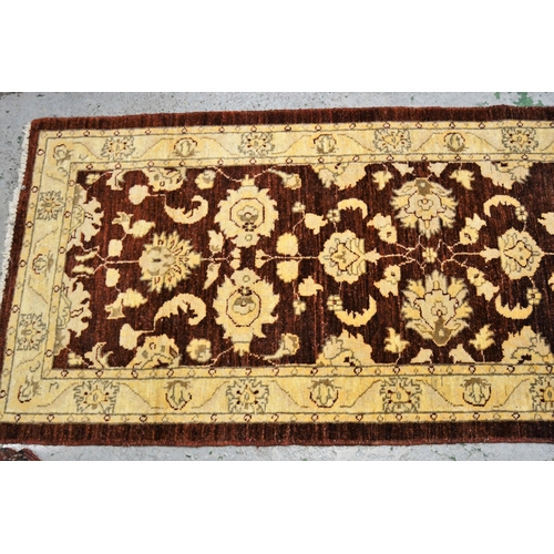 45 - Afghan Ziegler design runner with an all-over palmette design in shades of beige, rust and gold, 288... 