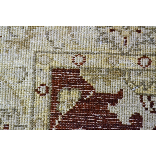 45 - Afghan Ziegler design runner with an all-over palmette design in shades of beige, rust and gold, 288... 