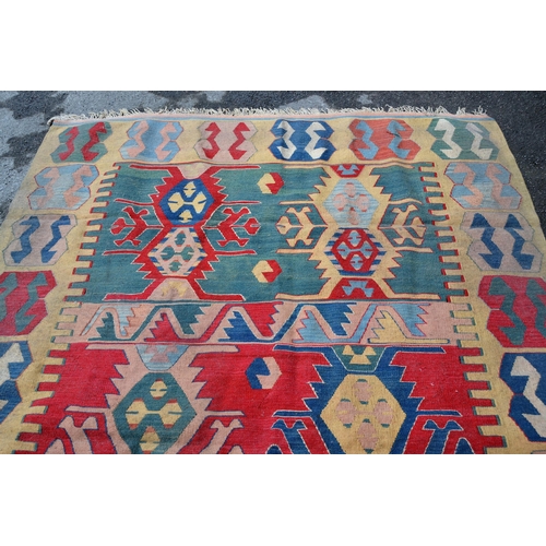 46 - Turkish Kelim rug in shades of beige, red, blue and teal, 260cms x 170cms