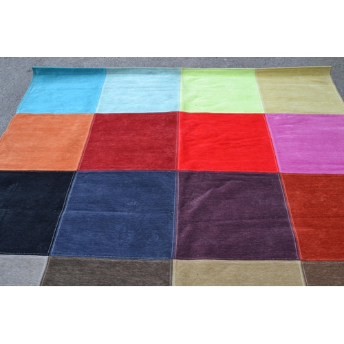 51 - Modern machine flat woven carpet of patchwork polychrome design, 270cms x 220cms