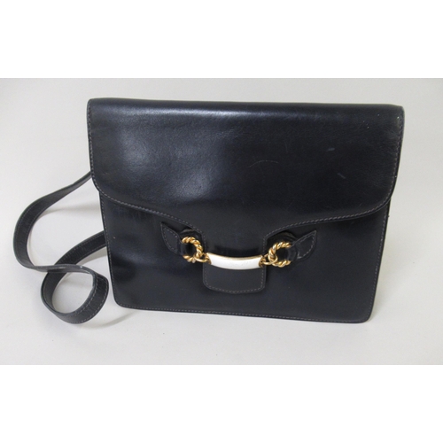 62 - Small ladies Gucci dark blue leather shoulder bag