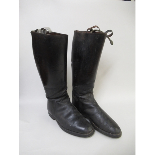 67 - Pair of black leather riding boots with spurs