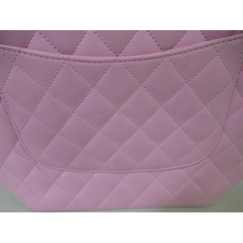 74 - Chanel Cambon Ligne pink and black quilted medium tote bag, complete with authentication card, care ... 