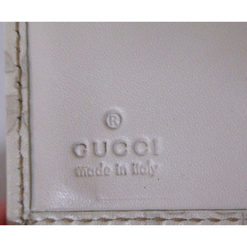 77 - Gucci, Guccissima leather agenda