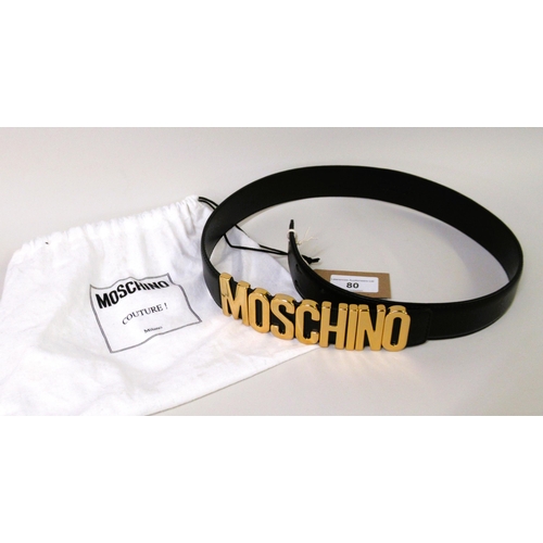 80 - Moschino, Milano, black leather belt with gold tone metal lettering, size 38, having original dust b... 