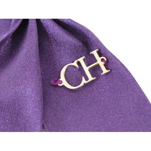 82 - Carolina Herrera, purple ribbon necklace with simulated pearl decoration