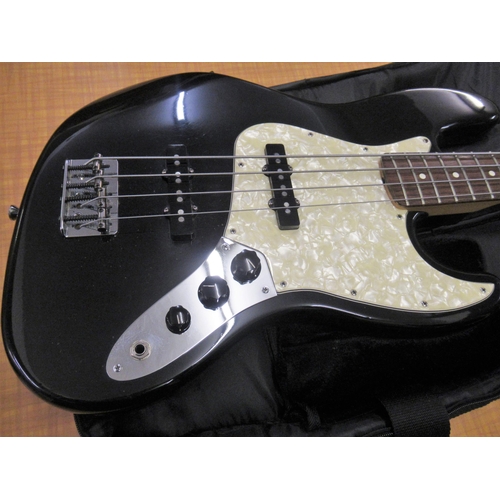 89 - Fender USA 1995 Jazz Bass, Serial No. N533030, black with white pearl scratch plate (probably a repl... 