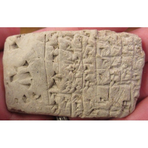 125 - Small collection of miscellaneous antiquities to include:  a cuneiform clay tablet, two terracotta o... 