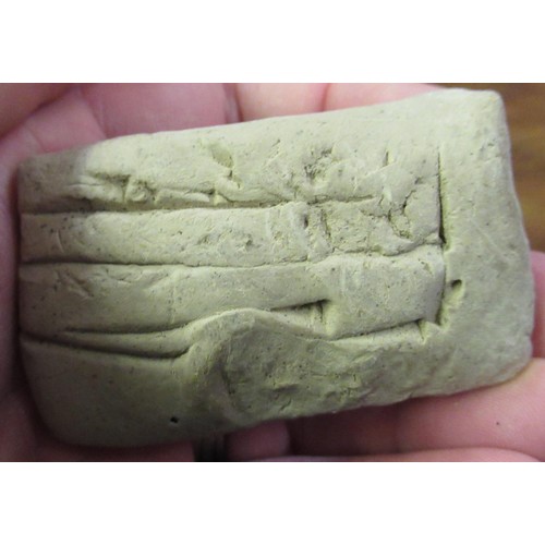 125 - Small collection of miscellaneous antiquities to include:  a cuneiform clay tablet, two terracotta o... 