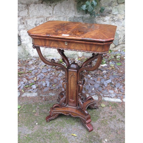 1592 - 19th Century feathered mahogany octagonal work table, the hinged cover enclosing a fully fitted inte... 