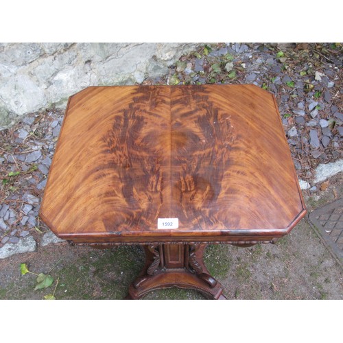 1592 - 19th Century feathered mahogany octagonal work table, the hinged cover enclosing a fully fitted inte... 