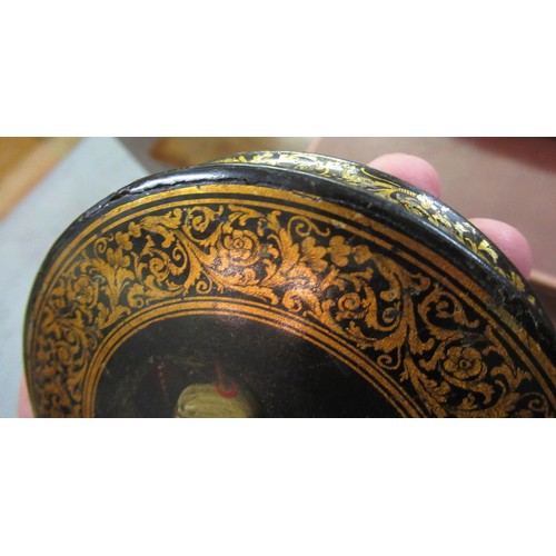 247 - 19th Century circular papier mache snuff box, the cover painted with portrait of a Turk