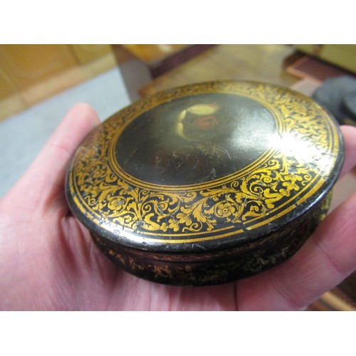 247 - 19th Century circular papier mache snuff box, the cover painted with portrait of a Turk