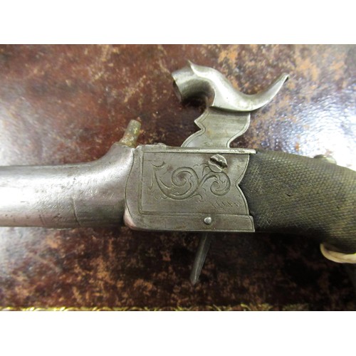 193 - Early 19th Century percussion cap pistol, the barrel with single touch mark in a walnut grip, togeth... 