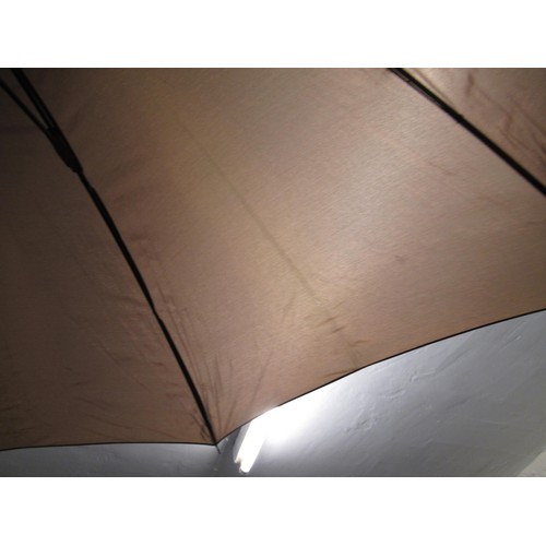 254 - Christian Dior umbrella, together with another umbrella