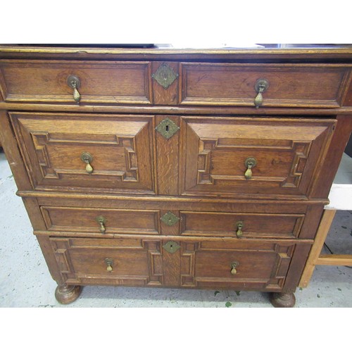 1395 - 18th Century oak two part chest of four long drawers, with geometric moulded fronts with original br... 