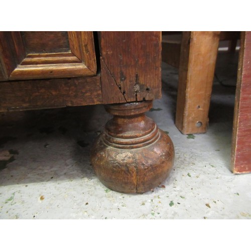 1395 - 18th Century oak two part chest of four long drawers, with geometric moulded fronts with original br... 