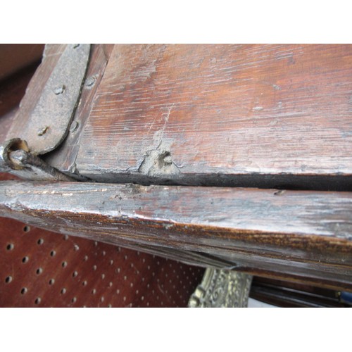 1446 - Small 17th Century oak coffer, the hinged three panel lid above a three panel front on stile support... 